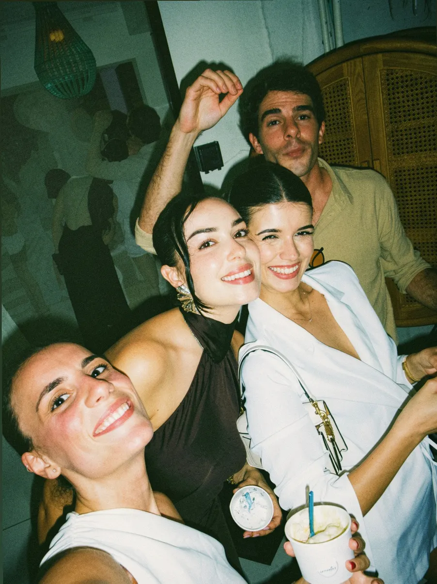 Guests laughing at a Dimora night