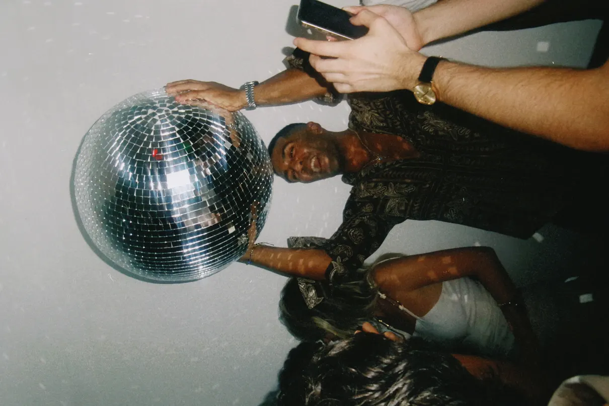 A disco ball above the dance floor